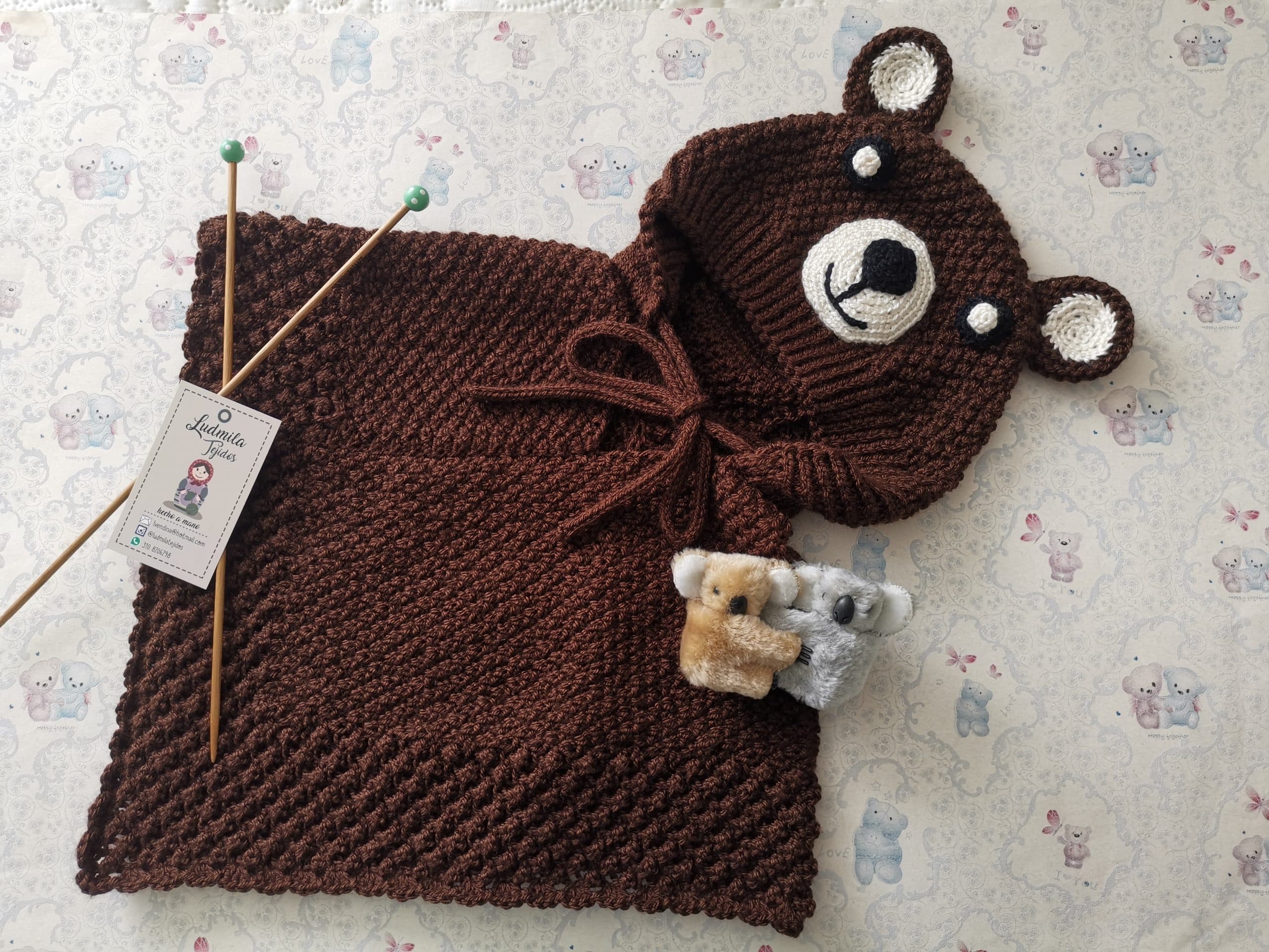 Hand-knitted baby poncho 6-12 months